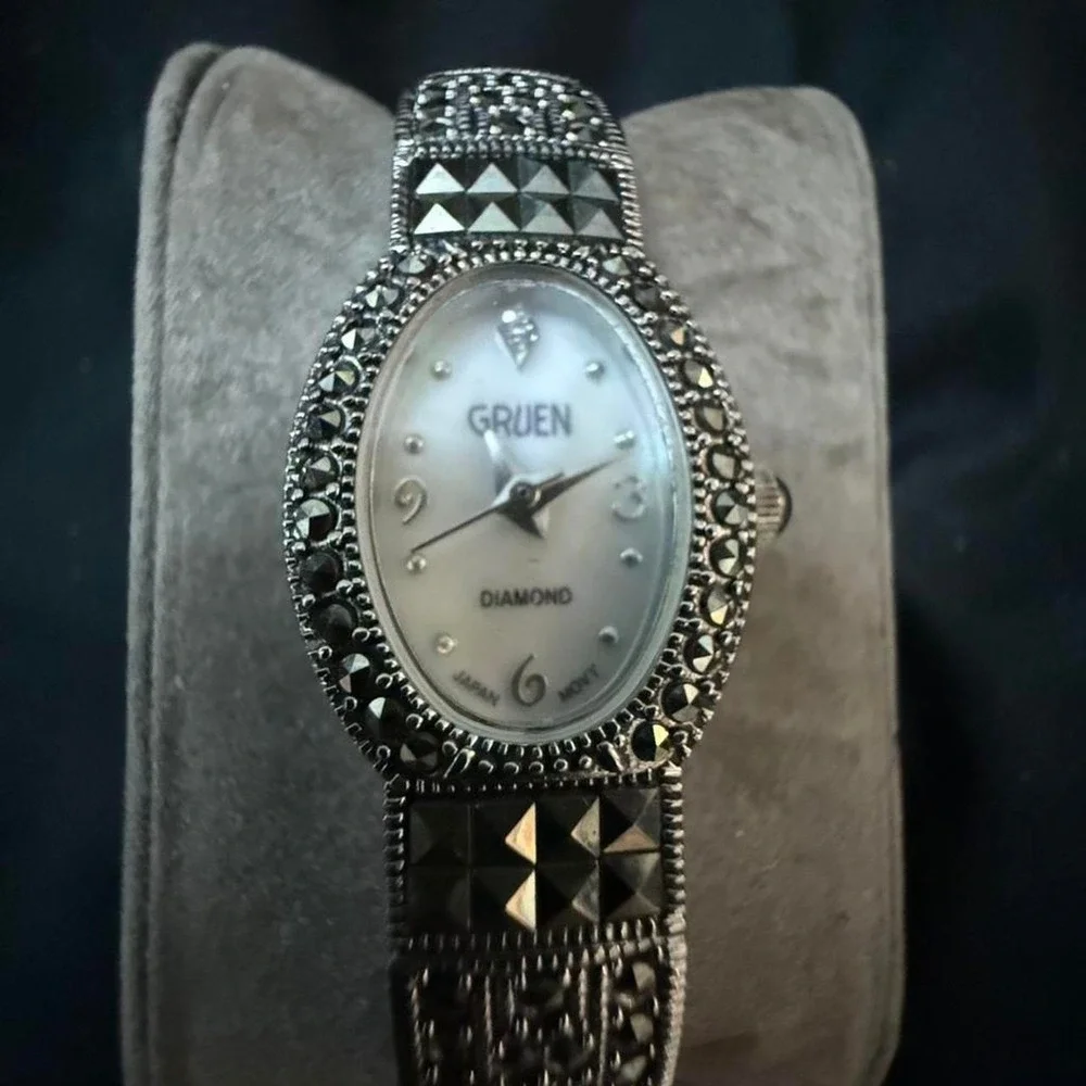 Gruen diamond watch with black and silver accents